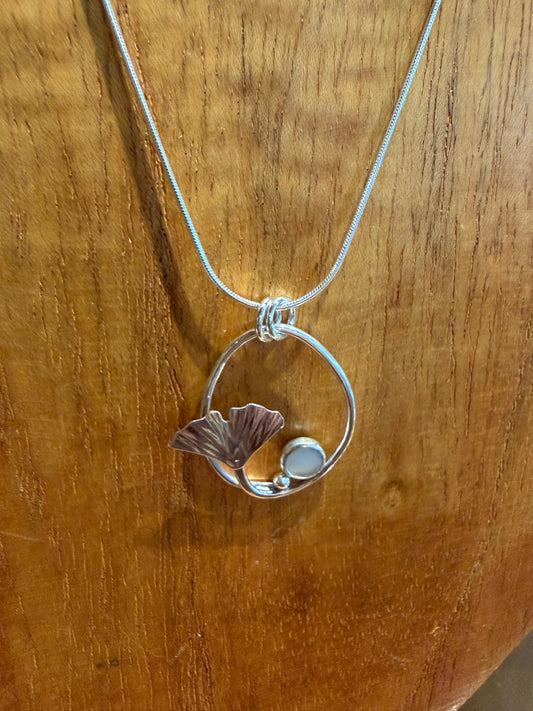 Oval Ginkgo mother of Pearl pendant by Meg Tang