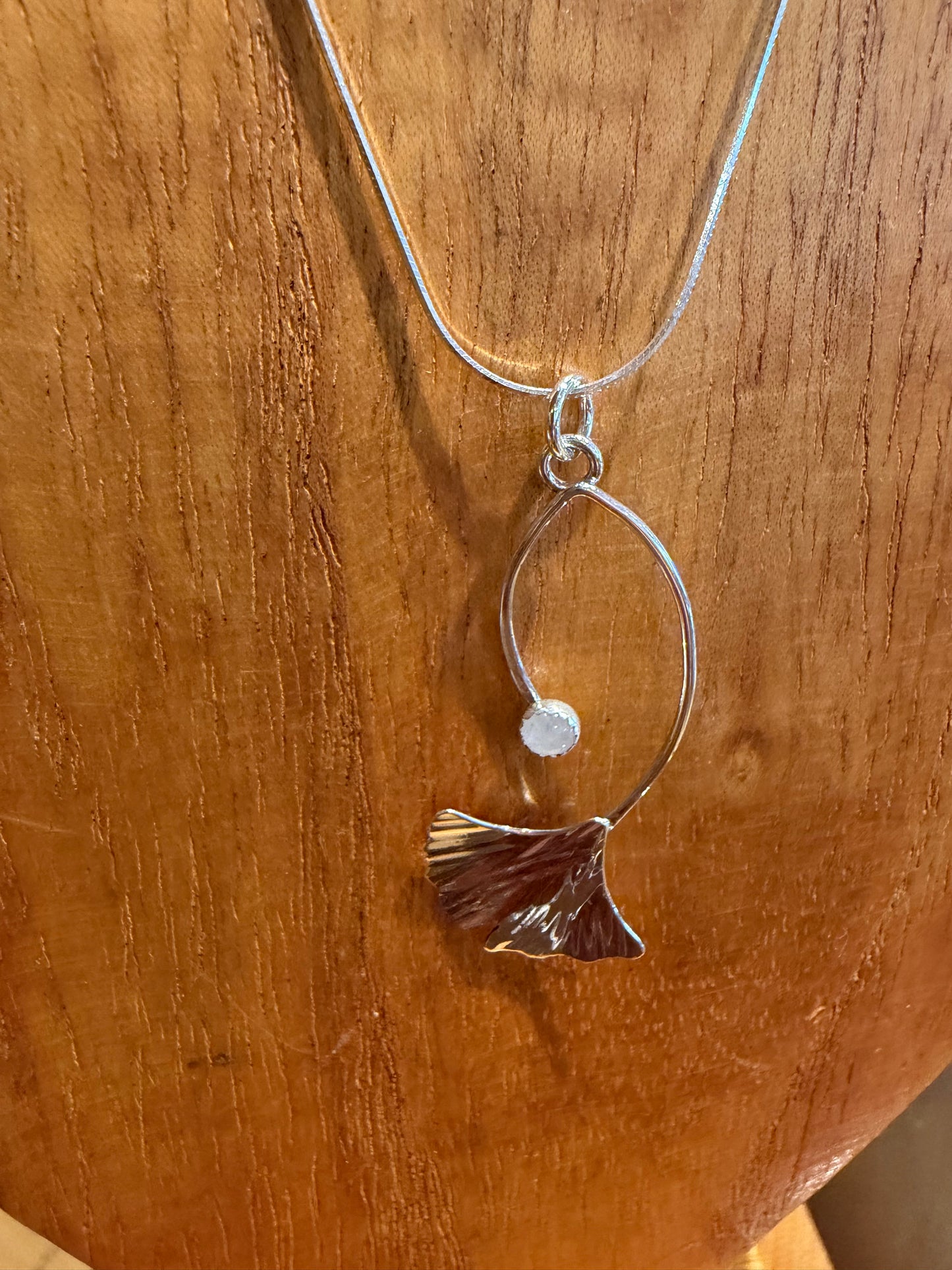 Ginkgo and moonstone pendant by Meg Tang